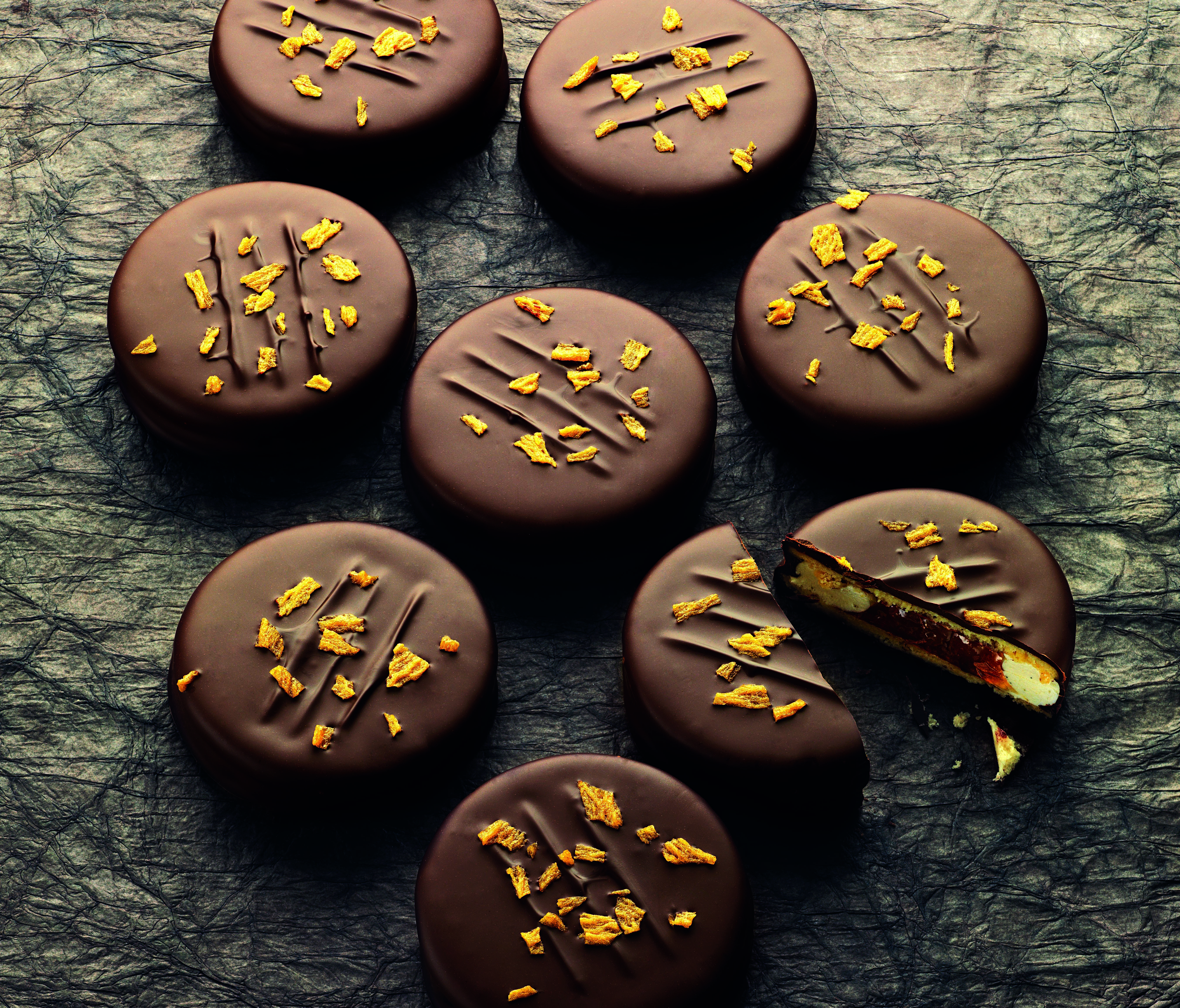 Apricot Cartwheels - Almond pastry, apricot jam and apricot mallow. Coated in Amedei dark chocolate.