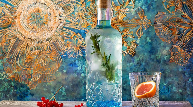 Decorative bottle of gin with a glass